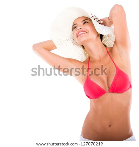 Beautiful woman in bikini enjoying her holidays - isolated over white