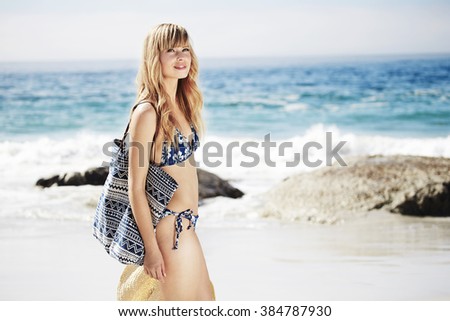 Beautiful woman in bikini on beach