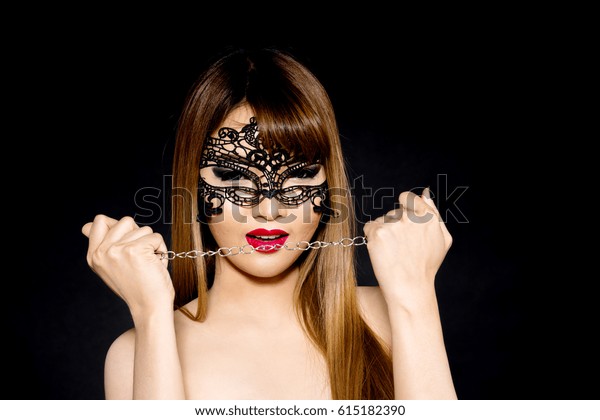 https://image.shutterstock.com/image-photo/beautiful-woman-black-lace-mask-600w-615182390.jpg