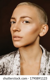 Beautiful Woman With Blonde Short Haircut. Art Fashion Editorial Portrait Made In Studio With Perfect Retouch
