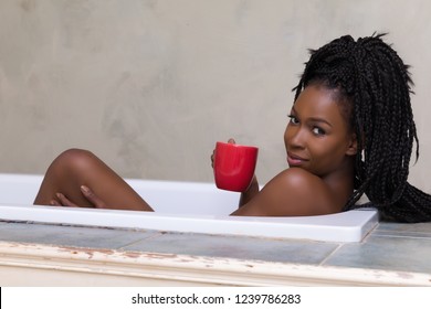 Beautiful Woman With Braided Hair Dreaming In Bath Tub