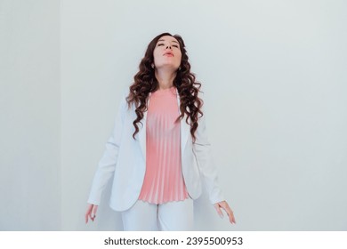 Beautiful woman brunette emotion portrait on white background - Shutterstock ID 2395500953