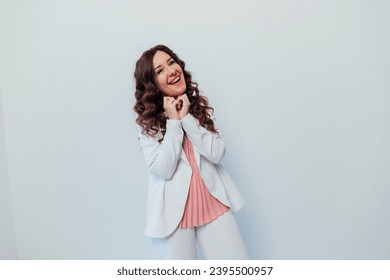 Beautiful woman brunette emotion portrait on white background - Shutterstock ID 2395500957