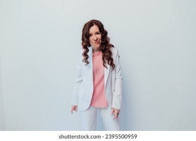 Beautiful woman brunette emotion portrait on white background - Shutterstock ID 2395500959