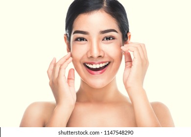 Beautiful woman cares for the skin face - posing at studio isolated on white with clipping path,asian Beauty. - Shutterstock ID 1147548290