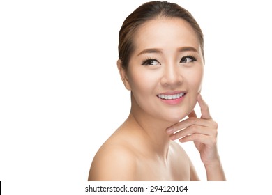 Beautiful woman cares for the skin face - posing at studio isolated on white with clipping path,asian Beauty.