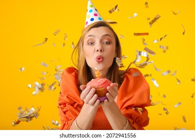 Beautiful woman celebrating birthday on color background - Powered by Shutterstock