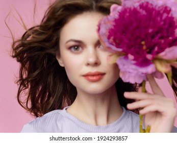 beautiful woman charm big flower attractive look close-up