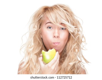 Beautiful Woman Chewing Green Apple. Young Girl Holding Fresh Fruit. Model Isolated On White Background. Motivation For Diet And Healthy Lifestyle. Positive Person With Happy Facial Expression.