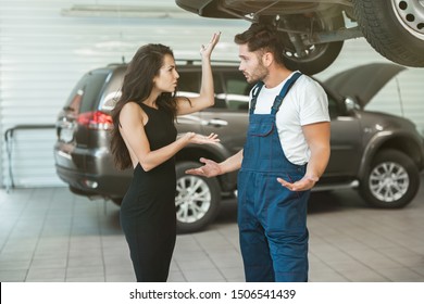 Beautiful Woman Client Is Complaining About Bad Service Provided By Mechanic In Car Damage Department