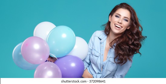 Beautiful Woman With Colored Balloons