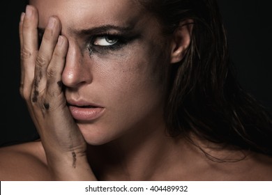 A Beautiful woman with dirty makeup