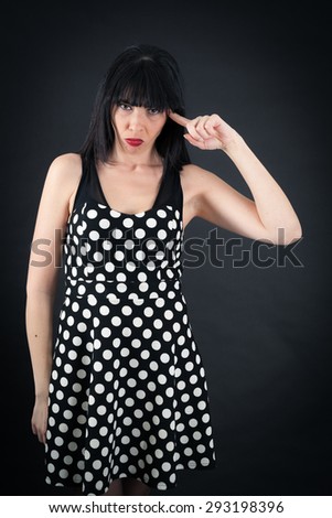 Beautiful woman doing different expressions in different sets of clothes: you are crazy
