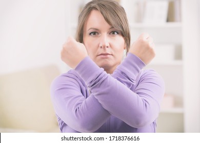 Beautiful Woman Doing Qi Gong Tai Chi Exercise At Home