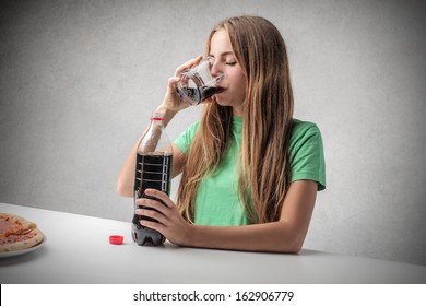 Beautiful Woman Drinking Coke