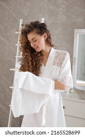 Beautiful Woman Drying Hair With Towel In Bathroom