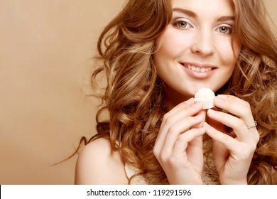 Beautiful Woman Eating Candy