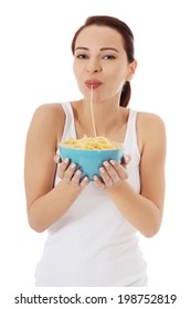 Beautiful Woman Eating Pasta From A Bowl.