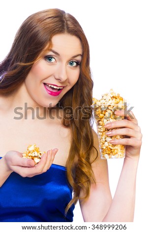 Beautiful woman eating popcorn isolated on white background