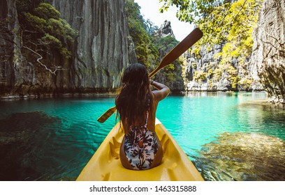 Beautiful Woman Enjoy The Time At The Lagoon In Coron, Philippines. Concept About Tropical Wanderlust Traveling