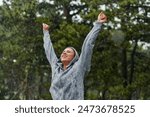 Beautiful Woman Enjoying Rainy Day After Intense Run