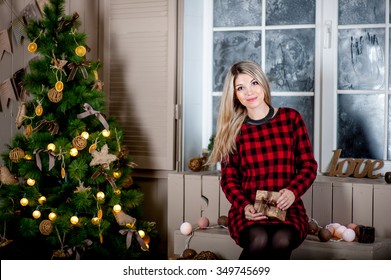 Beautiful woman of European appearance celebrating the January feast of rejoicing and feels happy