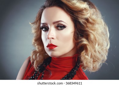 Beautiful Woman With Evening Make-up. Retro Style. Fashion Photo. 80s Hairstyle