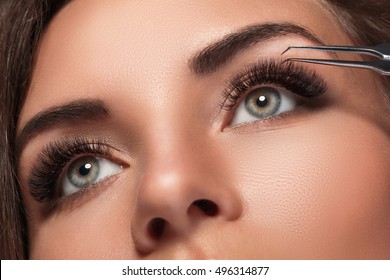 Beautiful woman with eyelash extension for maximum volume