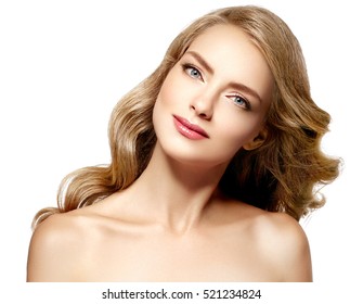 Beautiful woman face close up with long blonde hair studio on white