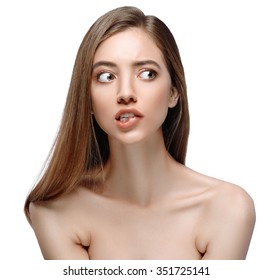 Beautiful woman face close up portrait young studio on white biting lip