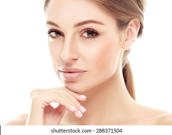 Beautiful woman face close up studio on white 