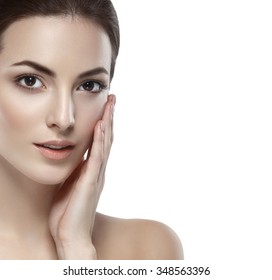 Beautiful woman face close up studio on white portrait - Shutterstock ID 348563396