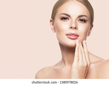 Beautiful woman face healthy skin cosmetic concept plastic surgery - Shutterstock ID 1580978026
