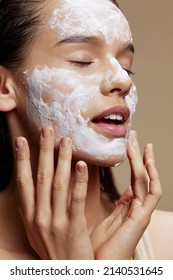 beautiful woman face mask cream clean skin facial scrub close-up make-up - Shutterstock ID 2140531645