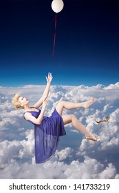 Beautiful Woman Falling Down From The Sky