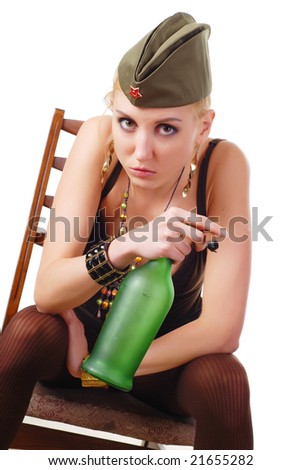 beautiful woman in field cap with bottle and cigar