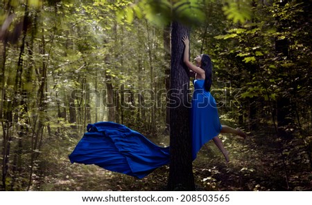 Similar – Mädchen in rotem Kleid im Wald