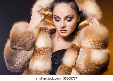 Beautiful Woman In A Fur Coat