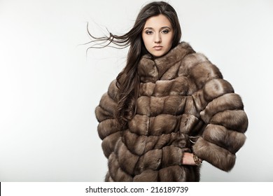 Beautiful Woman In A Fur Coat Fashion