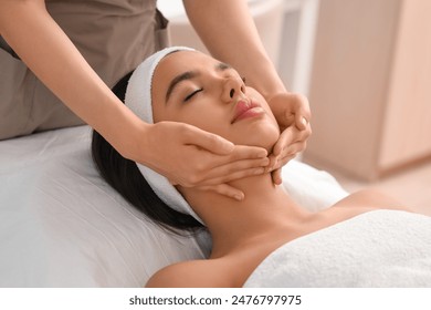 Beautiful woman getting facial massage in salon, closeup - Powered by Shutterstock