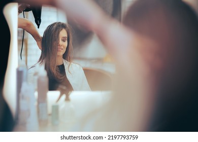 
Beautiful Woman Getting Her Hair Styled Professionally With A Hairdryer. Client Having A Professional Blowout In A Hair Salon
