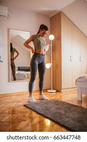 Beautiful Woman Getting Ready For Fitness At Home.