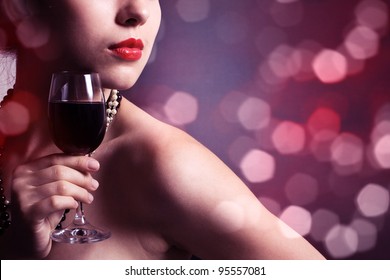 Beautiful Woman With Glass Red Wine