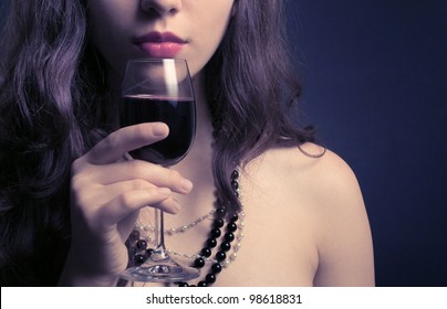 Beautiful Woman With Glass Red Wine