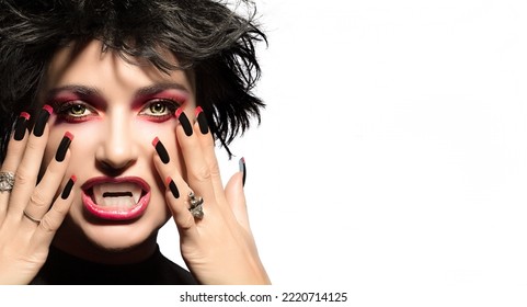 Beautiful Woman With Gothic Makeup, Fangs And Wolf Lenses. Halloween Vampire Makeup. Beauty Portrait Isolated On White With Copyspace