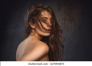 A Beautiful Woman With Hair On Her Face