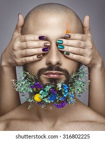 Beautiful Woman Hands With Nail Art And Man With Colorful Makeup On White Background, Flowers On Man Beard