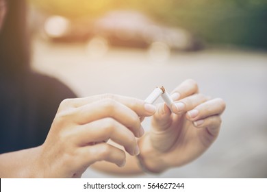 Beautiful Woman Happy To Breaking A Cigarette, Quit Smoking Concept, 