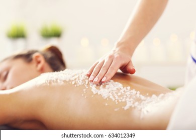 Beautiful woman having exfoliation treatment in spa - Powered by Shutterstock