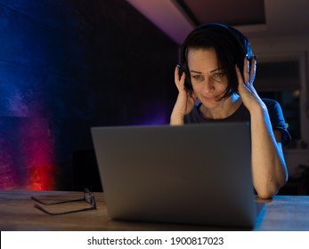 Beautiful Woman Having A Late Night Call On Her Laptop